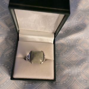 Handset Irish Connemara stone set in pure silver.  This ring is size 6.